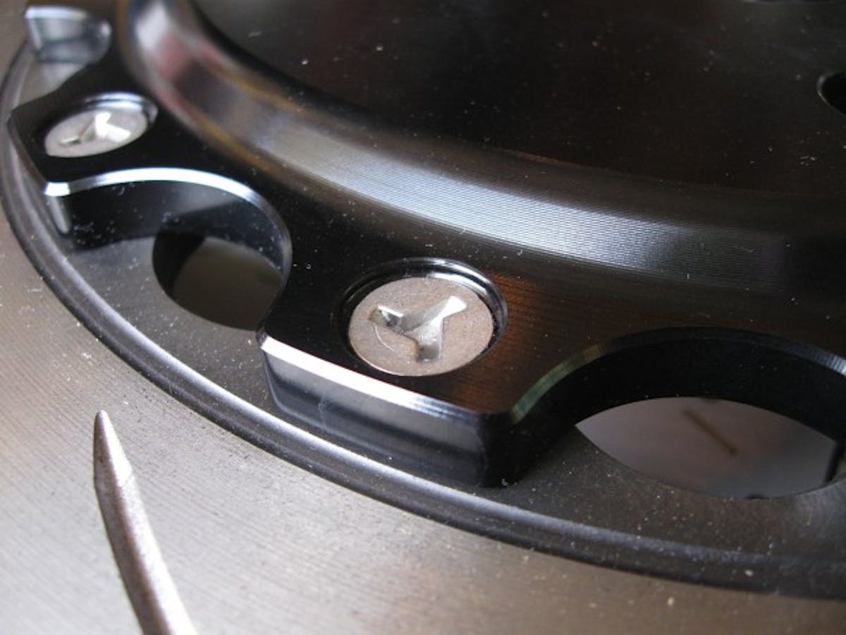 DBA's 5000 series discs use a two piece design that mounts the rotors on a lightweight aluminum 'hat.' One of the big advantages of this design is that when the disc surface is worn beyond spec, it can be replaced with a new one instead of scrapping the entire thing.