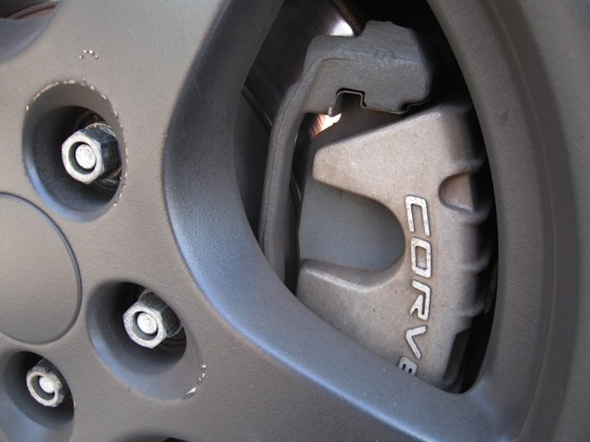 Our Corvette came factory equipped with sliding brake calipers (two piston in front, single piston out back) and vented solid discs.