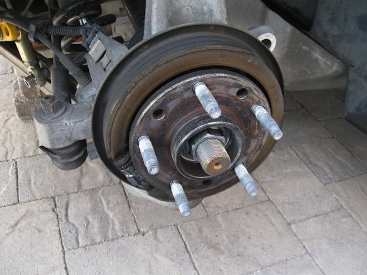 In back, the brakes incorporate a separate drum-type parking brake assembly. The DBA rotors are designed to accommodate this mechanism as well.