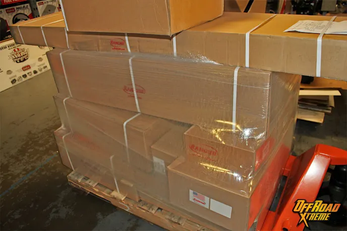 The boxes of parts sit ready to be added to the build.