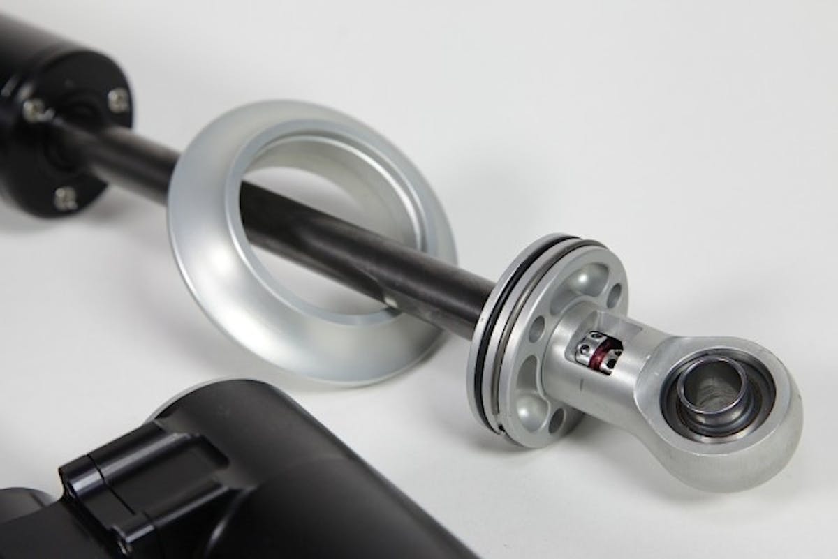 Here is a closer look at the rebound adjusters on the 4-way adjustable shocks. A pin is used to adjust the rebound. The pin is inserted into the adjuster, and turned in accordance with ho much, or how little rebound adjustment you're looking for.