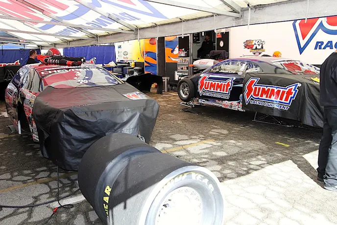 KB Racing with Greg Anderson and Jason Line have won six NHRA Pro Stock championships in this century and won't allow even the slightest peek at their equipment in the pits. Everything gets covered.