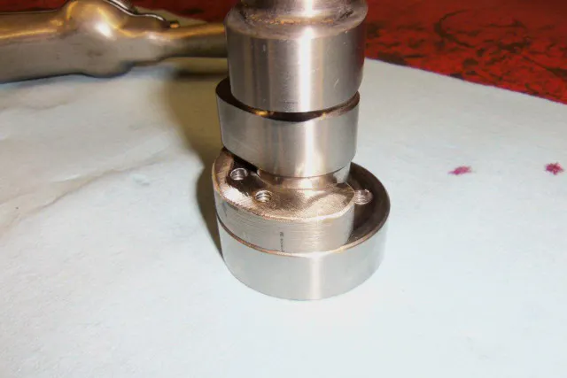 The specially-machined camshaft counterweight built by Terry 