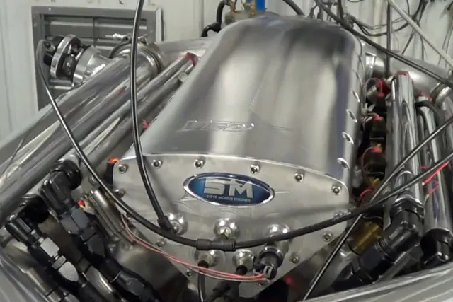 A view of the Visner Engine Development billet intake manifold, and the two sets of fuel rails. This engine requires a mountainous amount of fuel supply due to the non-intercooled, methanol-fueled design.