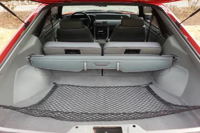 The factory net is still in the car. How many people tossed that in the trash the first day home with their Fox Mustang?!