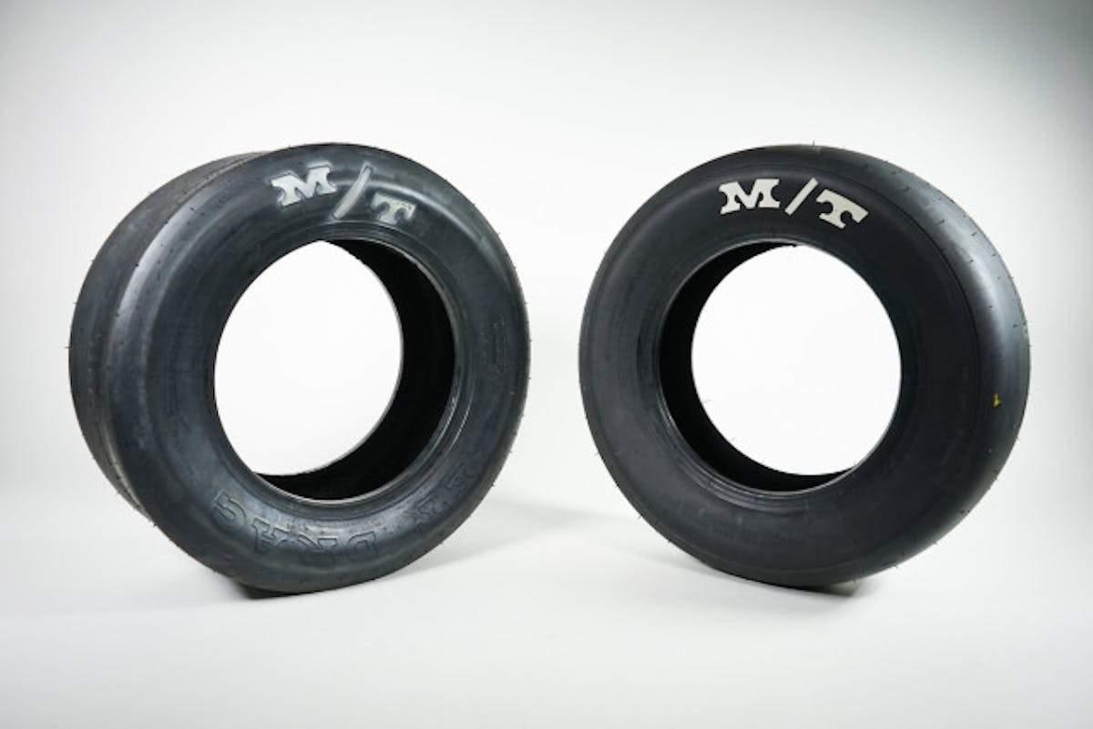 The ET Drag bias ply (left) shown next to the new 3052R (the "R" stands for Radial) 8.5-inch tire. On the surface, there's little difference between the two tires -- that is, until you dig into the tire surface and feel the difference in compounds.