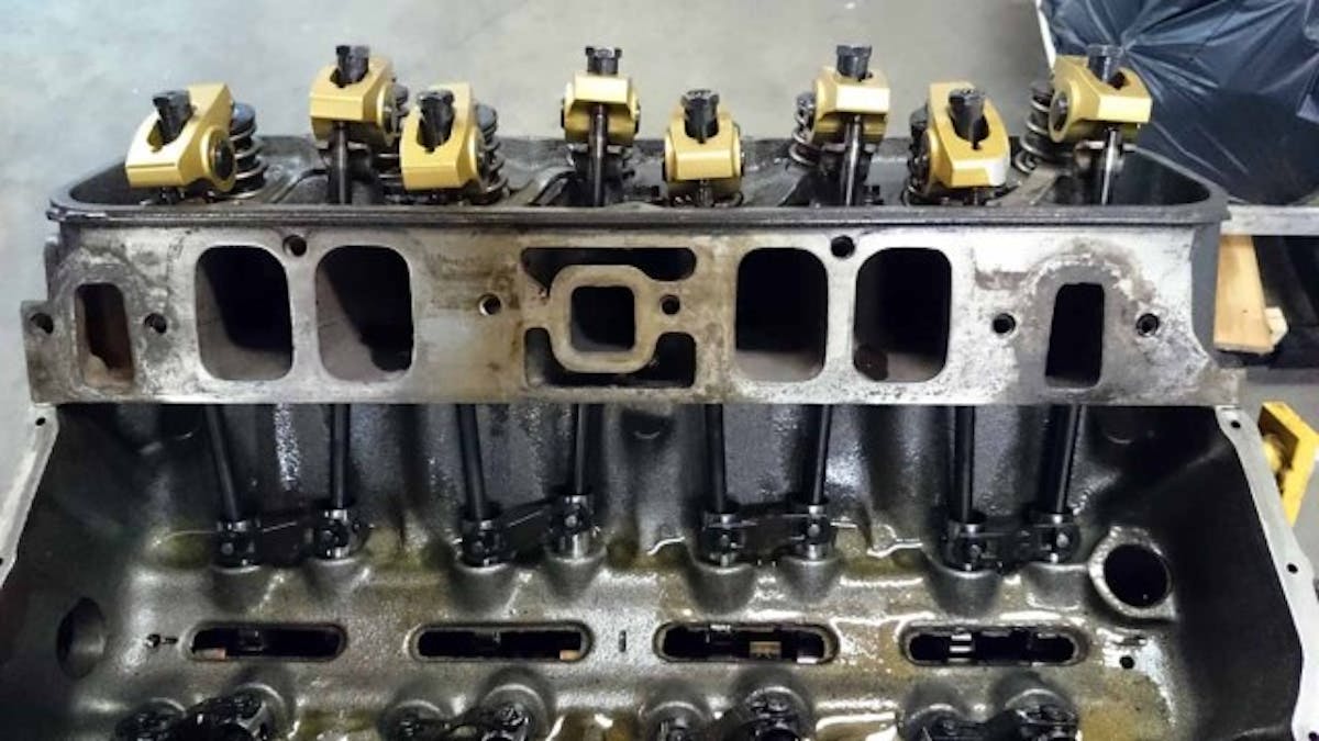 On the top side of the engine, van der Haven put his newfound skills with the grinder to work to tune up the cylinder heads and intake manifold. Valvetrain components are from Comp Cams, while Crane's gold race rocker arms are used.
