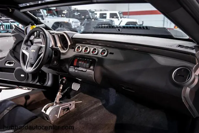 You'd be hard-pressed to find a nicer interior in a race car than the COPO Camaro. It looks a street car, and you could turn on the A/C and go for a cruise.