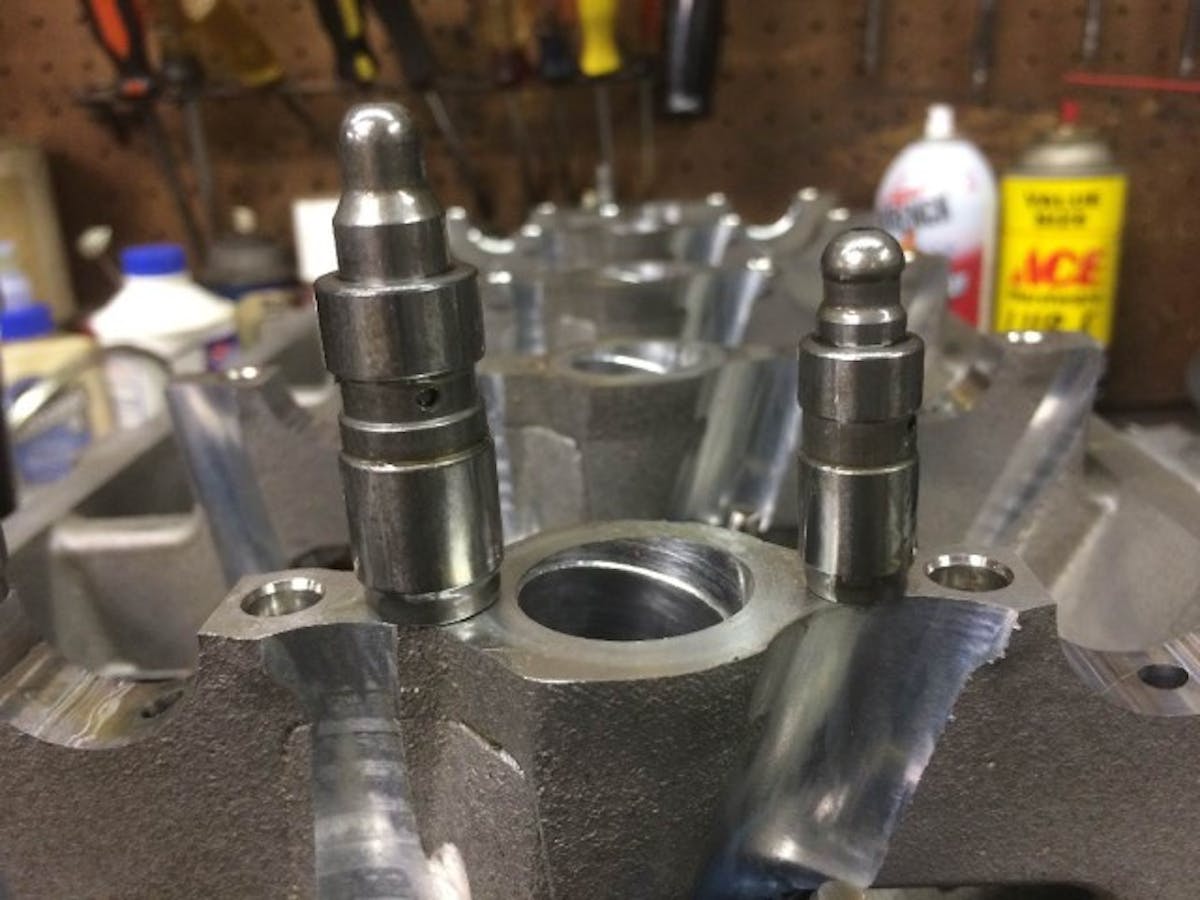Note the difference between smaller (intake) and larger (exhaust) valve lash adjusters. The more robust pieces are required to help open the exhaust valves in the forced-induction environment.