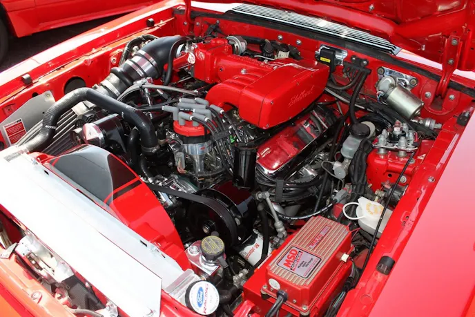 A Coast High Performance 408-inch Windsor sits under the '82 GT's stock hood.