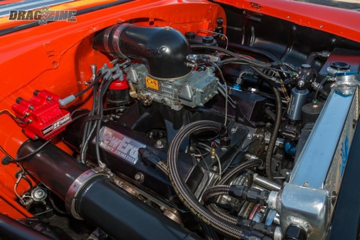 er the hood you can see Kirker's handy work on display from the headers to the piping for the Procharger.