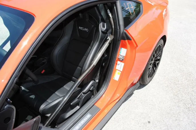 Swing out door bars make it easier to get in and out of the car when using the car as a daily driver, but still give you that safety at the track.