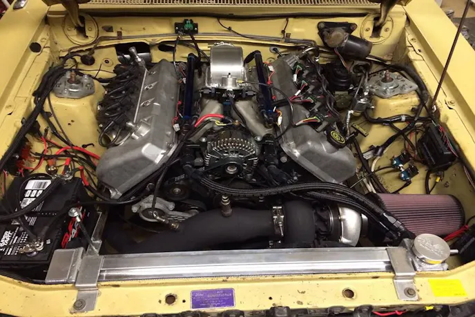 Using largely a 2003 Cobra engine, the powerplant disposes of the factory Eaton supercharger in favor of a Precision single turbo.