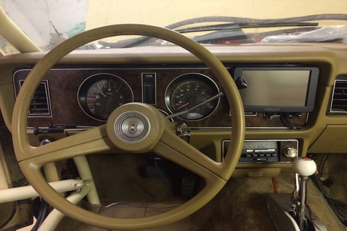 The Futura's basic interior is largely untouched. However, a Holley digital dash will keep Trillot of vital mechanical goings-on.
