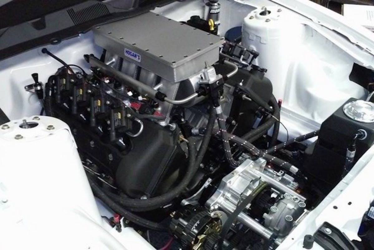 The engine uses a Hogan sheet metal intake to inhale air from a Vortech YSi supercharger. Behind the built Four-Valve is a M&M Transmission Turbo 400 with an Ultimate Converter Concepts stall converter.