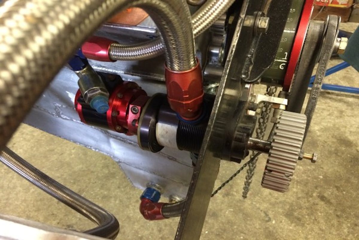 Single stage oil pump with the mechanical fuel injection pump driven off the back of the oil pump.