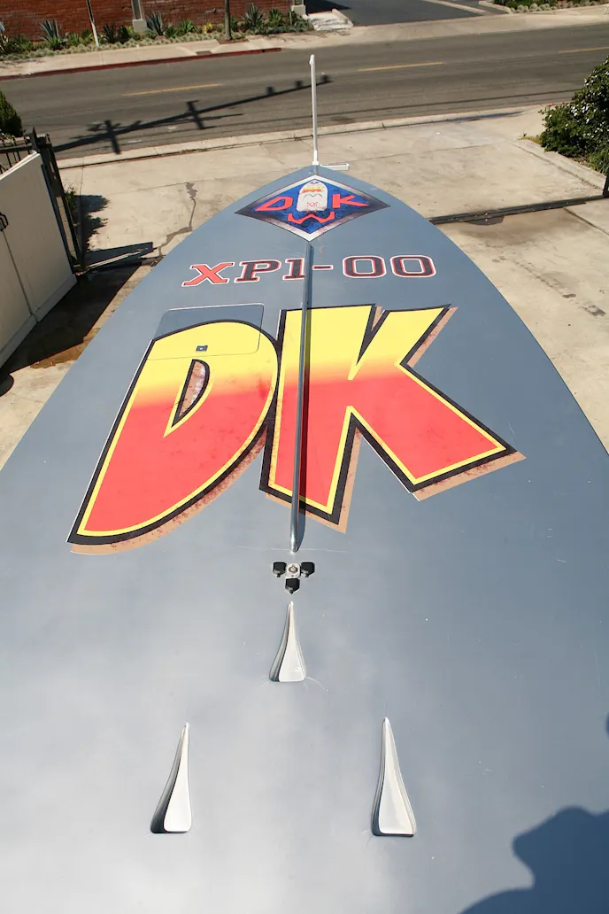 Kutscher and Weismann share billing on the long, long bow of the offshore boat.