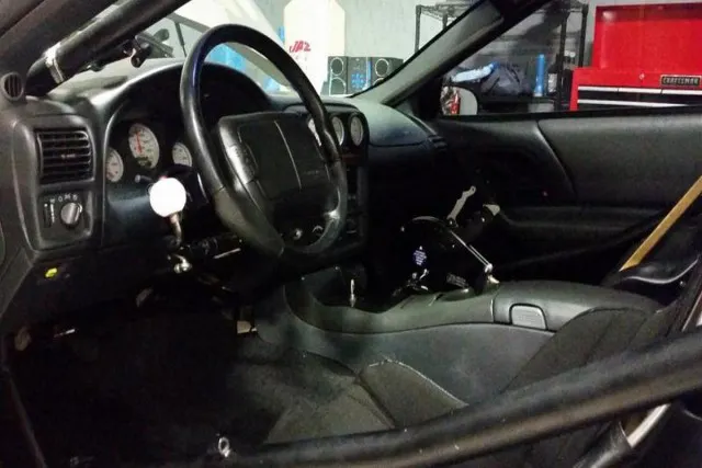 Since he is paralyzed, Scottywheels' Camaro features hand controls to enable him to race the car.