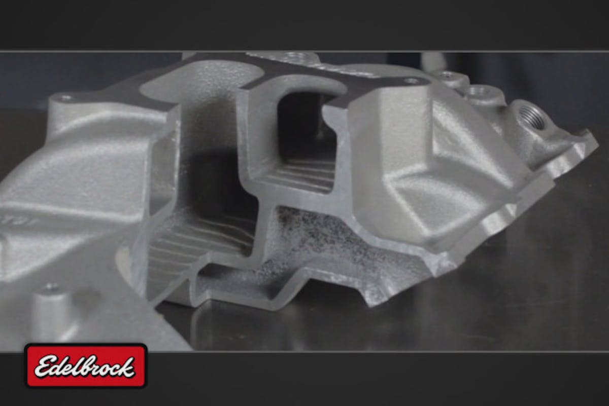 This cutaway of a dual-plane manifold shows how each half of the manifold pulls from only one side of the carburetor during operation.