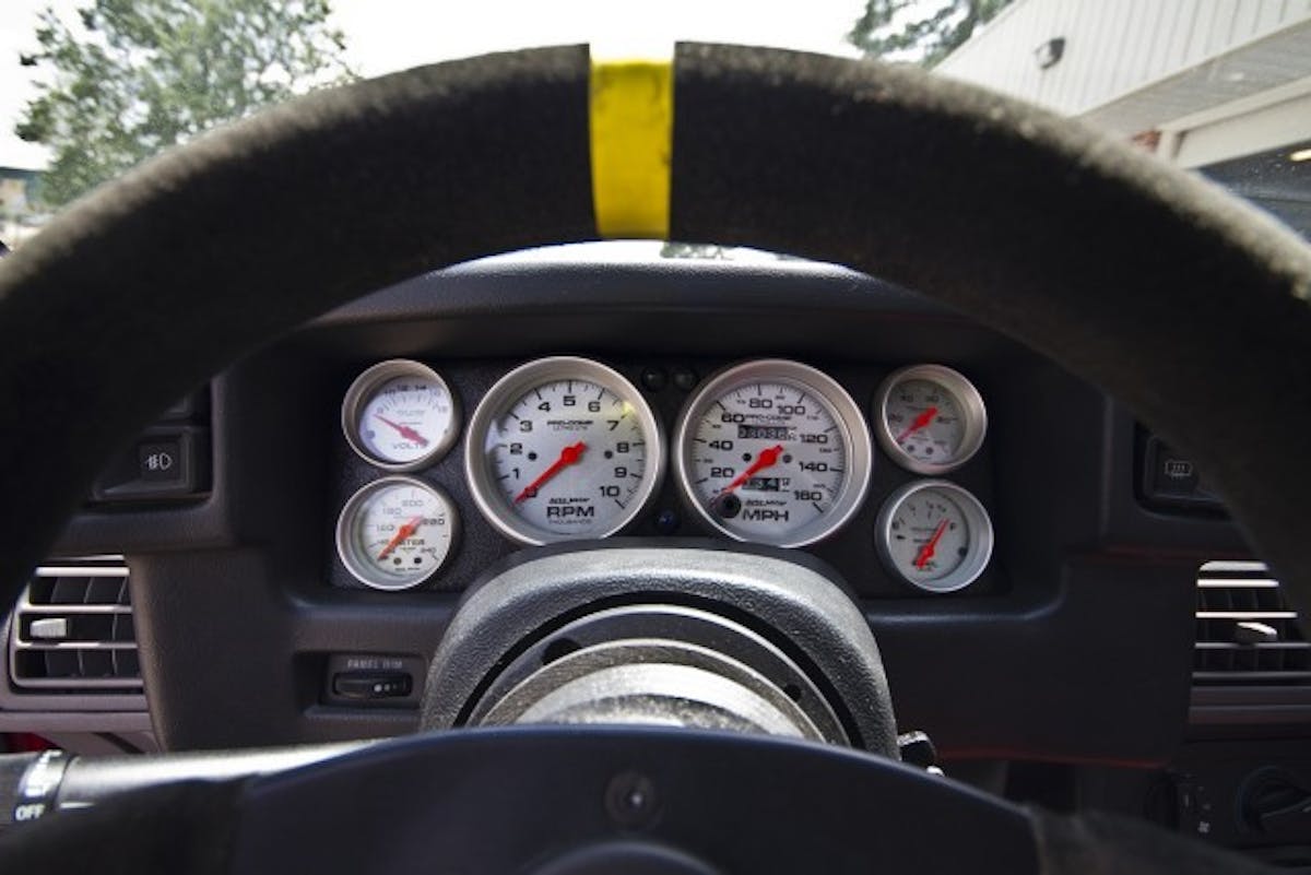 Looking through the Sparco suede steering wheel you get a good look at the Florida 5.0 cluster featuring Auto Meter gauges.