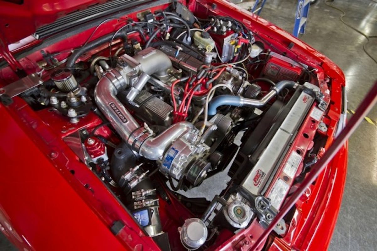 The Cobra's air intake consists of a Chicane Sport Tuning (RIP Joe) intake box, an SCT Big Air 90mm mass air meter, and an Edelbrock 75mm throttle body.