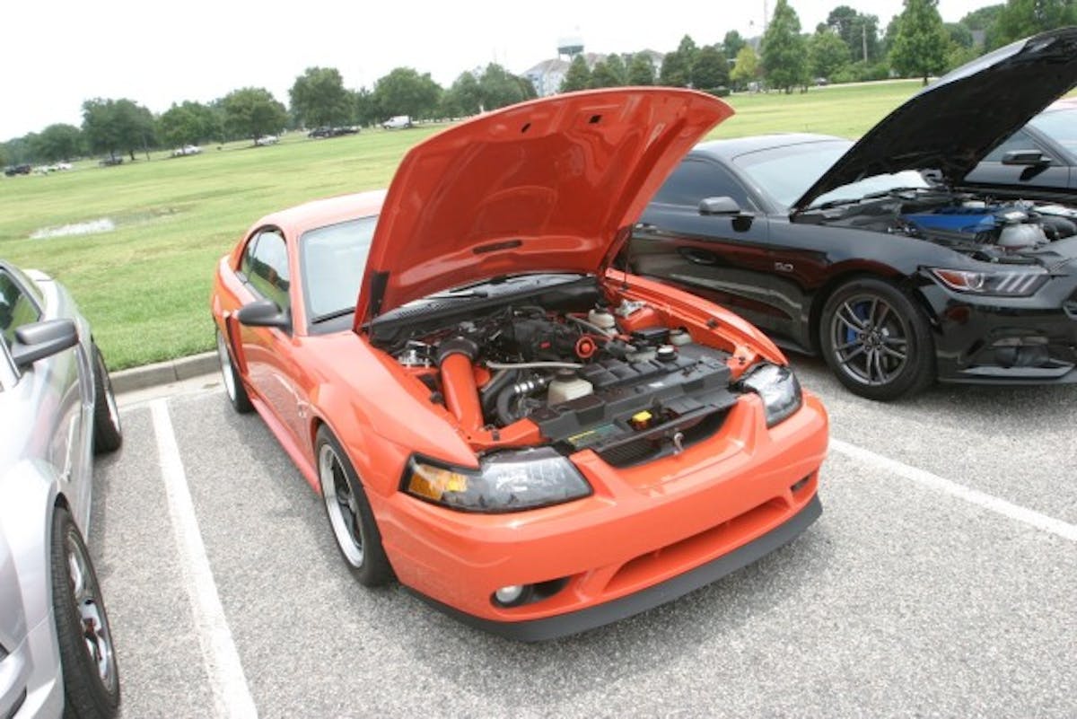 I chose this car because it shows the endless possibilities of how a person can modify a Mustang. The owner wasn't around, but we have to guess this is a 2001 Cobra with either a Terminator swap, or an Eaton on the stock Four-Valve engine. The transmission knob showed a 5-speed pattern so that is our best guess. Either way, I like it. 