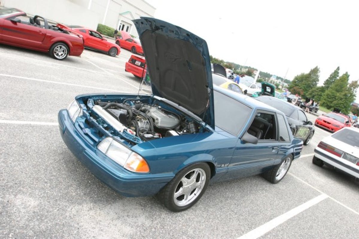 A Reef blue Fox coupe with a black interior, are you kidding?! In the Fox world you have pretty much reached the summit with this combination. It's pretty sad there aren't more Fox cars at Mustang Week, but it's the nature of the beast. 
