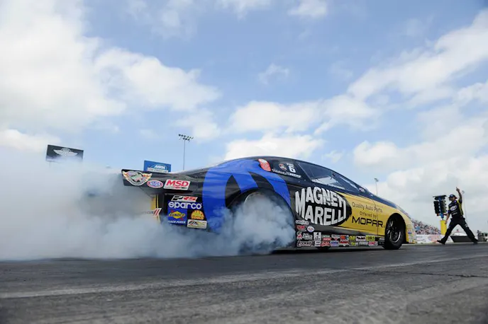 Allen Johnson took his CFE Racing Products all the way to the winner's circle in NHRA Pro Stock competition during the 18th Annual Lucas Oil Route 66 Nationals at Joliet, IL in July 2015.