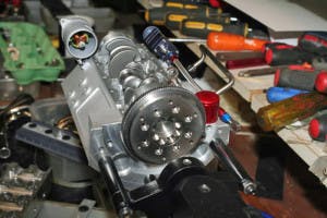 The flywheel and ring gear assembly mounted to the crankshaft.