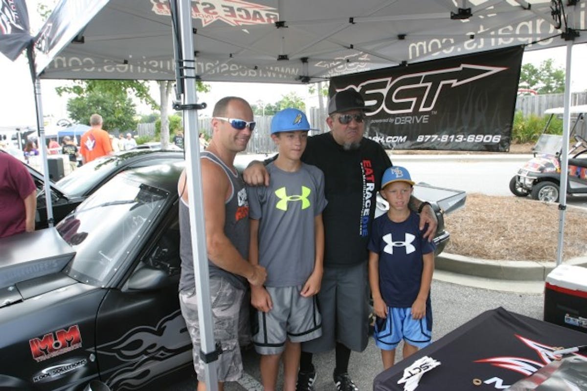 The world famous, and legendary Mustang drag racer Mike Murillo was at Mustang Week with Lafawnduh to sign autographs in the SCT booth. Here he's trying to teach youngsters how to "Mean mug." It appears they're not hip to the old man's ways. Kids these days!!!