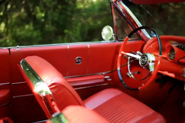 The red interior in Don's convertible came from a 59 Impala. You can tell by how bright it is. 