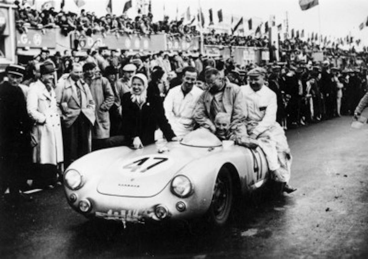 Zora (driving) and wife Elfi (right) after he won the 1100cc Class at LeMans in 1954 in a Porsche 550 race car. It was Duntov's first—and biggest—racing win.