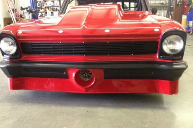 That front air source is designed to force incoming air right into a ProCharger F-1X-12 supercharger.