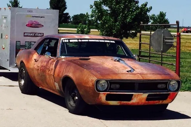 Here's the typical set-up for Rocky Mountain Race Week participants. Events like the call for a trailer-full of supplies and spare parts towed by the race car. Not fun in the rain, but that's how it goes. 