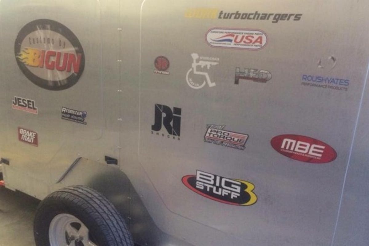 The side of Yost's trailer is the perfect billboard for sponsor stickers. We're not sure how many people are paying attention to the trailer, as much as it's being towed by an 8-second Camaro.