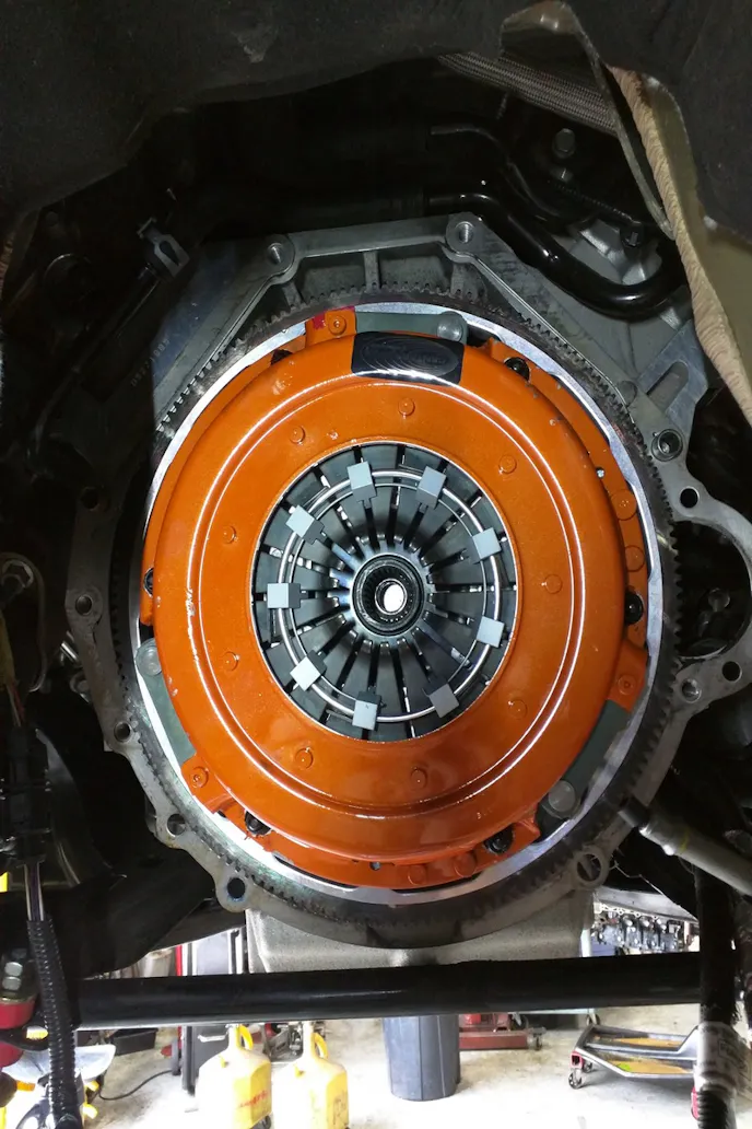 Of course, the flywheel is mounted first, just like conventional clutches. Then assemble the clutch's discs, floater plate, and flywheel in the proper fashion, and tighten the pressure plate to the flywheel. The transmission can now be reinstalled.