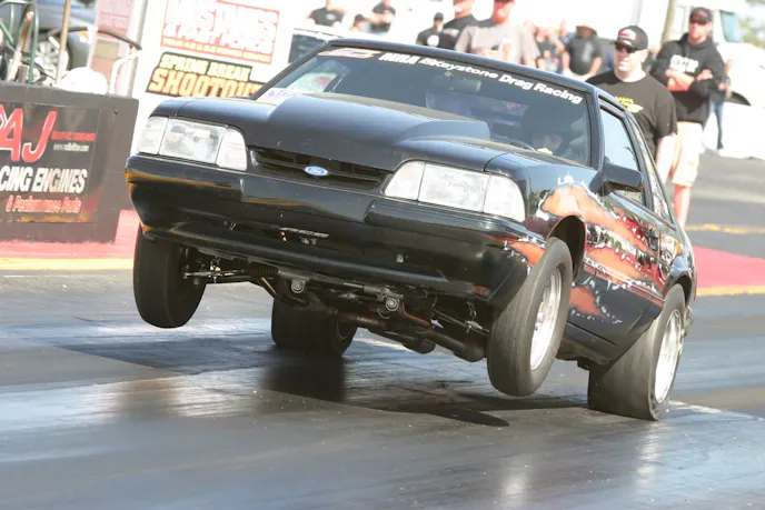 This is usually how Drew Lyons' Coyote Stock car leaves the line. He and crew chief Bruce Hemminger had to focus on the car's chassis set-up and tire pressure in order to get the car to leave at Joliet.