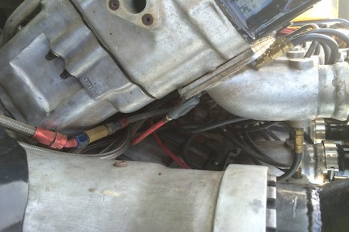 Note spark plug wire, and the multiple fuel injectors per cylinder.  