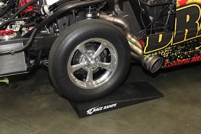 This one of Race Ramps' Jack Assist ramps. The Jack Assist ramps allows you to drive up on the ramp, and enable you to get your car off the ground high enough to get it on a jack, or on a two-post lift.