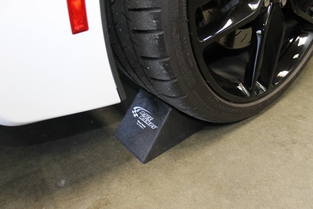 Good ole wheel chocks, Race Ramps has those, too. All of us have used them, and will use them again. These come in handy in a variety of automotive situations, and can make sure your race car stays where it's supposed to either in the garage, the driveway, on the dyno, or on the trailer.