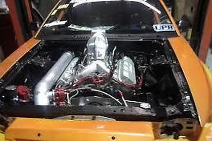 That is a 423-inch small block using a Dart block, GRP rods, Edelbrock SC1 heads, a Jesel belt drive, and much more. Steve Morris Racing Engines just freshened it up, and it has zero passes on it. The engine's first pass could be made by you.