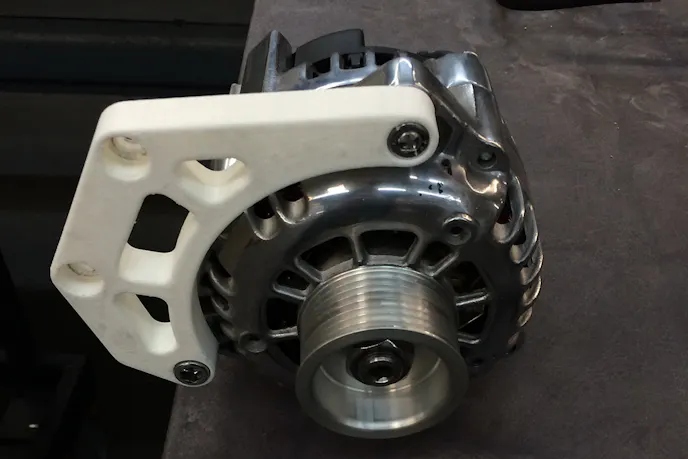 An example of an alternator bracket for a SB Chevy that was prototyped by COncept One using 3D printing techniques. Images via Concept One.
