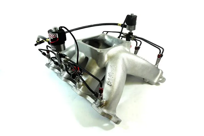 This is an example of an Induction Solutions' X275 direct port nitrous system. This is a wet kit that supplies both fuel and nitrous through the same nozzle.
