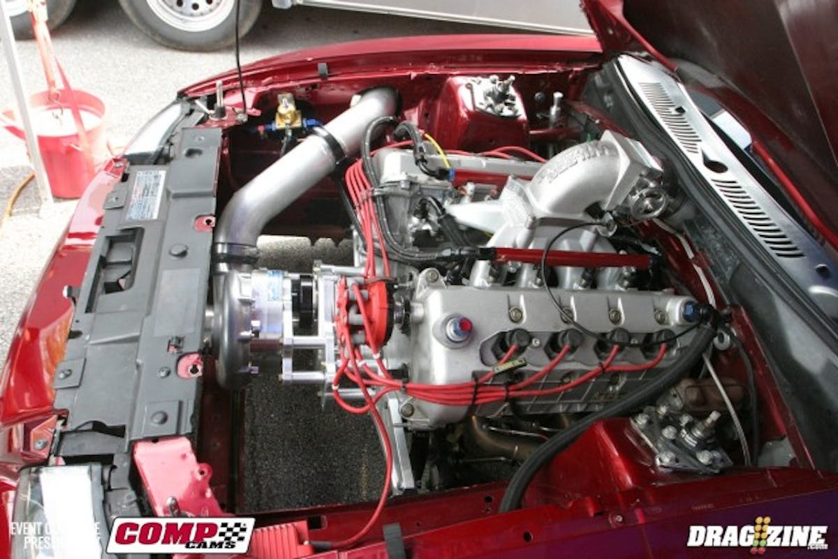 Another NMRA regular giving the NMCA side a go is Jim Breese. Bresse has competed in NMRA's Modular Muscle, Real Street, and most recently, the Renegade class. The Renegade and NMCA Extreme Street rules are pretty close, and Breese is giving it a shot with a ProCharger-blown Four-Valve, Rossler Turbo 400, and an Ultimate Converter Concepts converter. Last night's qualifying pass was Breese's first hit with the old design Mickey Thompson ET Street radials. His best in Renegade trim with the new Mickey Radial Pros is an 8.14. He bettered that number in round two of qualifying today.