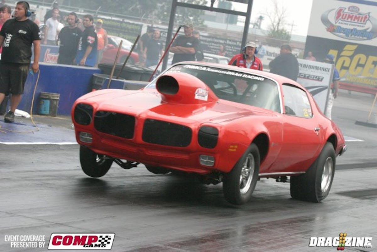 Dwight Ausmus made a tune-up change to his NA 10.5 Firebird, and it really helped on top end, but it hampered front half performance. So he tried to get some of that front half back during third round of qualifying, and the car dipped back into the 8.0s. 