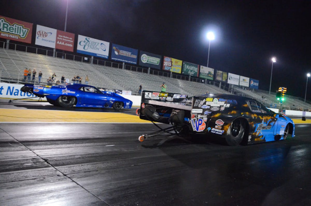 In a battle of teammates, Kevin Fiscus beat Jim Bell on both ends of the racetrack in the Pro Mod final, 5.94 to a 5.99.