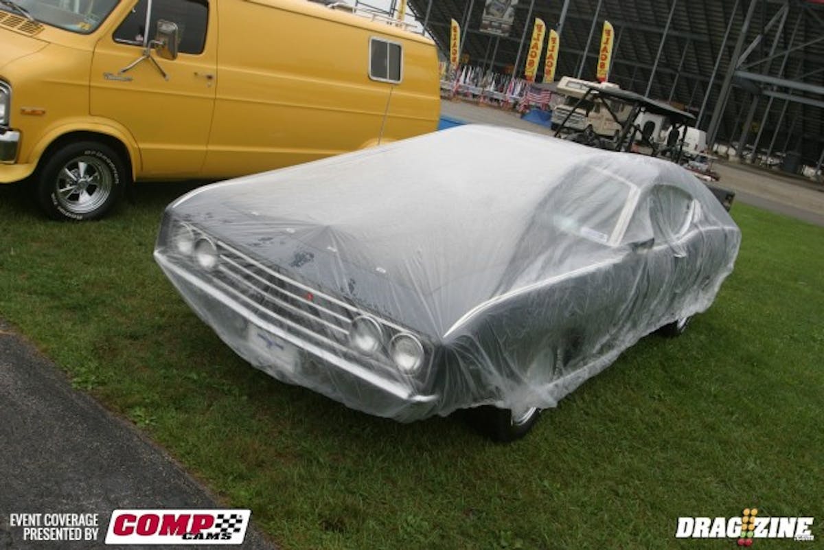 The owner of this Torino Talladega in the car show doesn't trust that the rain is done for this morning. Thankfully, it's a clear car cover so we can still the awesomeness that is a Talladega. 
