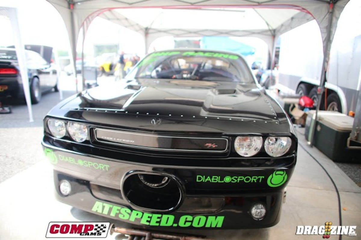 Three weeks ago, Rob Goss had a broken engine block after an event with Jeff Kinsler driving at MDIR. He's got the car all back together thanks to Bruce Maichle, HHR Performance,and the rest of the guys onhis crew. This time around, he's got an iron block on board, which he says puts him a bit overweight but will hopefully provide a bit more durability. As Goss is the trendsetter with GenIII Hemi drag racing, it's only natural that he finds all of the weak links in the engine components.