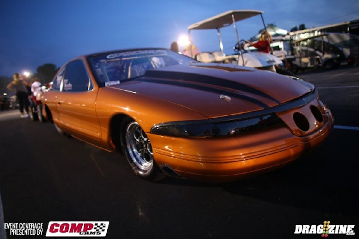 Although Dave Cappolina didn't make it into the Outlaw Big Tire field tonight, he was ecstatic to be sitting in the driver's seat of the car. Formerly owned by Tom Kasper, Cappo took delivery of it a year ago at this race and has been slowly creeping up on the tuneup, gaining valuable seat time in the process. The car has a fresh DiSomma 449 with twin Precision 88mm turbos. He's been trying to find the fine line of performance with the BigStuff3/NLR1000 boost controller combo. 