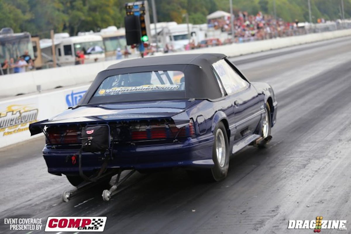 Caught up with longtime Ford racer Louie Proto this morning in the tower. Lou finally threw all of the nitrous to his convertible Mustang last night--three kits in all--and made it into the Outlaw Big Tire show on the last run last night. Unfortunately, he was here to give notice to the track to call an alternate, as he hurt an exhaust valve in the process. Lou's slowly been chipping away at the program for a long time, and feels he's finally got a handle on what it takes to get the lightweight Mustang rolling. 'Two degrees of timing is huge at the nitrous level we use,' he says.